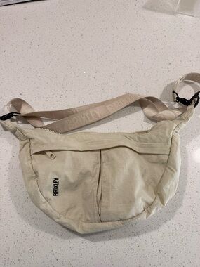 BRIXLEY Cream Crossbody Bag with Branded Strap